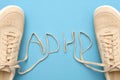 Women sneakers with laces in adhd abbreviation text Royalty Free Stock Photo