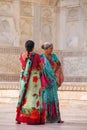 Women standing outside Taj Mahal in Agra, Uttar Pradesh, India