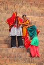 Women standing on the stairs leading to Jama Masjid in Fatehpur