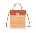 Women summer basket bag with leather flap, handle and shoulder strap. Female wicker handbag from cane. Modern fashion