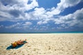 Woman is sunburning on the beach Royalty Free Stock Photo