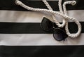 Women sunglasses on white and black beach bag