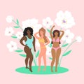 Women in swimsuits of different nationalities and physiques are standing opposite white flowers Royalty Free Stock Photo
