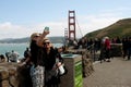 Women Take Selfie With Golden Gate Bridge In Background