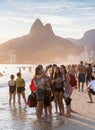 Women take selfie in Ipanema beach, Rio de Janeiro at sunset