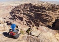 Women takes photo on High Place of Sacrifice. Petra. Jordan.