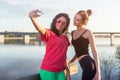 Women taking picture of herself, selfie at beach Lifestyle sunny image best friend girls happy vacations.