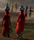 Women taking water at Sand Dunes Khuri, Sam, Jaiselmer, India