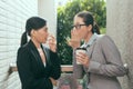 Women talking about office gossip Royalty Free Stock Photo