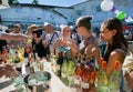 Women tasting red and white wine