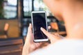 Women texting on smartphone in cafe close up on hand