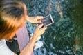 Women texting on smartphone in cafe close up on hand