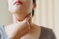 Women with thyroid gland test . Endocrinology, hormones and treatment. Inflammation of the sore throat