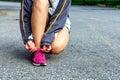 Women are tied to the shoes to prepare for the marathon. Royalty Free Stock Photo
