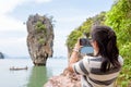 Women tourist shooting natural view by mobile phone Royalty Free Stock Photo