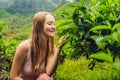 Women tourist at a tea plantation. Natural selected, Fresh tea leaves in tea farm in Cameron Highlands, Malaysia Royalty Free Stock Photo