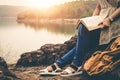 Women tourists read book in the holiday in quiet nature, Concept reading a book