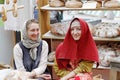 Women in traditional dress and handkerchiefs at the festival `Times and epochs` in Kuznetsk bridge in Moscow