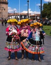 Women in traditional dress in the Plaza Cusco Peru