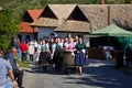 Women in traditional dresses going to the Easter Holy Mass in Holloko village, Hungary Royalty Free Stock Photo