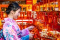 Women in traditional japanese kimonos at Fushimi Inari Shrine in Kyoto, Japan