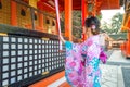 Women in traditional japanese kimonos at Fushimi Inari Shrine in Kyoto, Japan Royalty Free Stock Photo