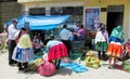 Women in traditional peruvian clothes and hats on the streets of Cuzco city Royalty Free Stock Photo