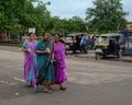 Women in traditional saree walking on street in Jaipur, India