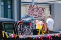 Women in truck bed holding signs in Trans Black Lives Matter demonstration in French Quarter Royalty Free Stock Photo