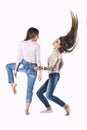 Women are two models in fashionable clothes in jeans in the Stud Royalty Free Stock Photo