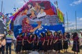 women in typical Mayan costume with their large colorful kite with tissue paper, with written messages Royalty Free Stock Photo