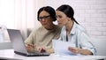 Women use online services adult lady studying how to pay for utilities on laptop