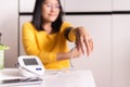 Woman using blood pressure & heart rate monitors in yourself at home Royalty Free Stock Photo