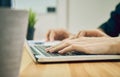 Women using a laptop in the display and technology advances in stores. Royalty Free Stock Photo