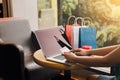 Women using laptop for shopping online and earn points to website. Royalty Free Stock Photo