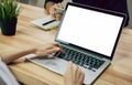 Women using a laptop on white screen. Take your screen to put on advertising Royalty Free Stock Photo