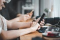 Women using smartphone in coffee shop