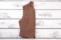 Women vest folded on wooden background. Royalty Free Stock Photo