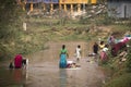 Women washing clothes in Srimangal, Bangladesh