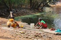 Women washing their clothing.