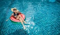 Woman in pool villa