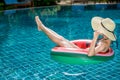 Woman in pool villa