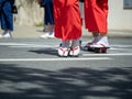 Women wearing geta footwear walking along the streets Royalty Free Stock Photo