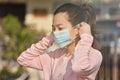 Women wearing medical masks to prevent coronavirus infections in the community