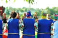 Women wearing ukrainian clothes with embroidered flowers celebrating pagan holiday of Ivan Kupala, back view