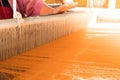 Women weaving traditional thailand silk. Royalty Free Stock Photo