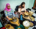 Women processing argan oil Royalty Free Stock Photo