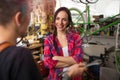 Women working in a bicycle repair shop Royalty Free Stock Photo