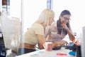 Women working together, office interior Royalty Free Stock Photo