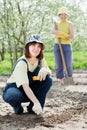 Women works at garden in spring Royalty Free Stock Photo